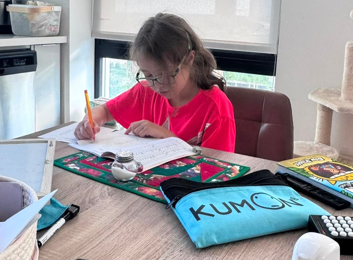 Maria's daughter during a math practice session